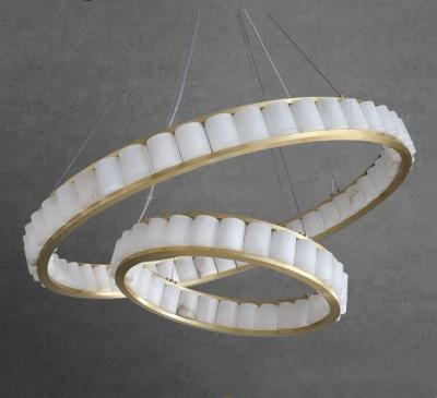 Chine Éclairage circulaire personnalisé de style nordique Alabaster Lumière suspendue moderne pour le foyer et l'escalier à vendre