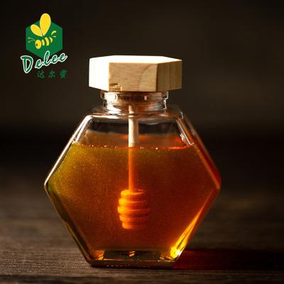 China 100% natural pure honey 1000ml glass jars and bottles natural bee honey for sale for sale