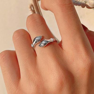 China Trend Direct Manufacturer Women Hand Hug Engraved Ring Jewelry Adjustable 18K White Gold Plated 925 Silver Hand Rings For Men for sale