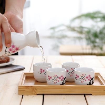 China Viable Japanese ceramic sake set with four flower cups hand painted pink pottery porcelain wine pot traditional ceramic cup for sale