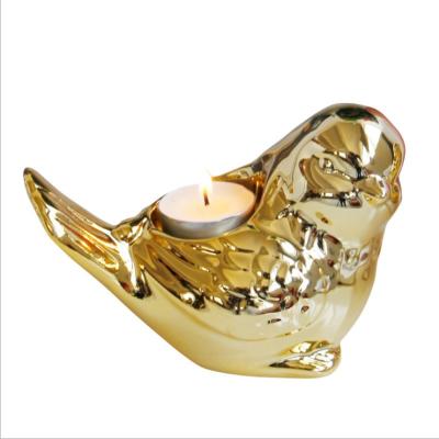 China Home Decoration Creative Ceramic Candle Holder Bird Gold TeaLight Cup Candle Holder For Weddings Christmas Ornament Home Decor for sale