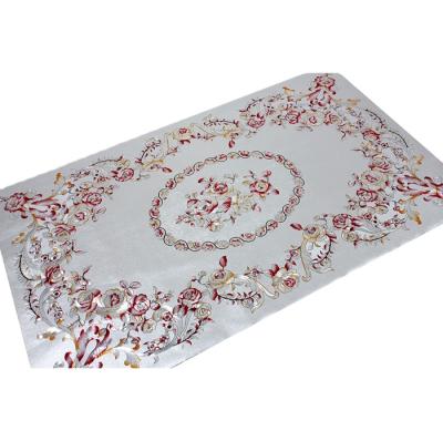 China Oilproof Embossed Flower PVC Table Cloth for sale