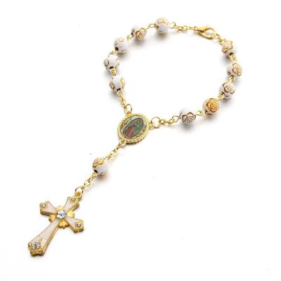 China Religious Women Beaded Christian Exquisite Acrylic Gold Cross Flower Religious Angel Heart Pendant Cross Bracelet For Rosary Bracelet for sale