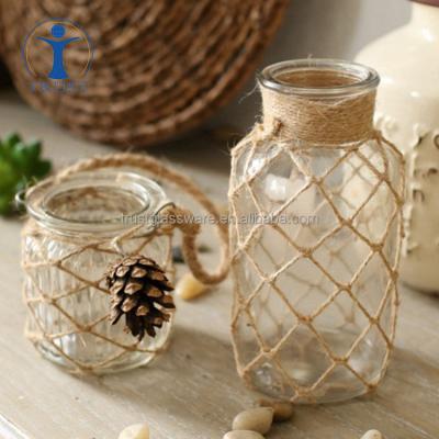 China Wholesale new fashion home wedding wedding decoration modern creative clear bottle glass vase with rope for sale