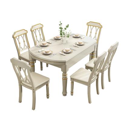 China Solid Wood Expandable Pure Dining Set American Round Retractable Dining Table Solid Wood Folding Dining Table and Chair Set for sale