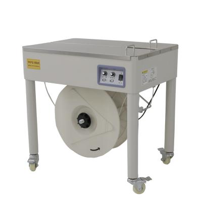 China Yongsheng ZW semi-automatic food strapping machine is suitable for carton packing for sale