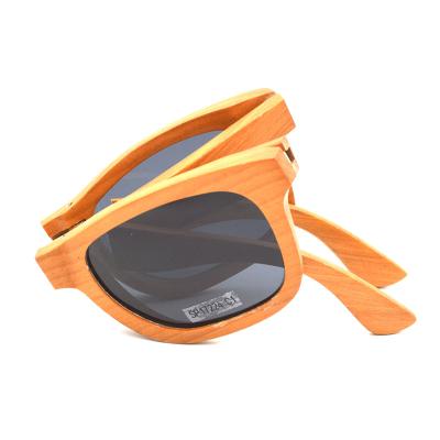 China Large Handcrafted High Quality Foldable Thin Glass UV400 Sun Glasses Wooden Frame Sunglasses for sale