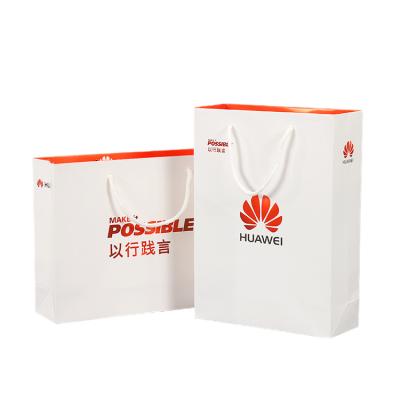 China Recyclable Custom Logo Design Printing Advertising Shopping Carry Paper Bag For Mobile Phone Packaging for sale