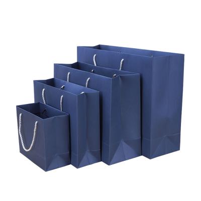 China Recyclable luxury cheap wholesale custom logo paper gift bag custom shopping bag for clothes for sale