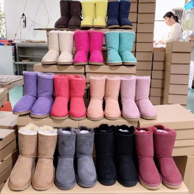 China CUSHIONING Winter Fashion Women's Shoes Warm Wool Sheep Hairy Snow Boots With Pompom Plush Flat Casual Boots for sale