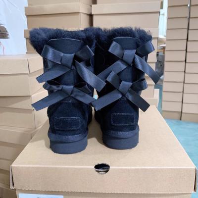 China High 2022 HOT Winter Mid-Tube Thick Snow Boots 2 Flat Bow Heel Women Snow Boots for sale