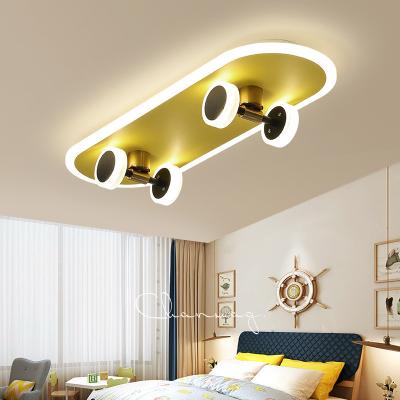 China Surface mounted Nordic modern design scooter ceiling lamp for living room personality bedroom lamp children's simple creative ceiling lamp for sale