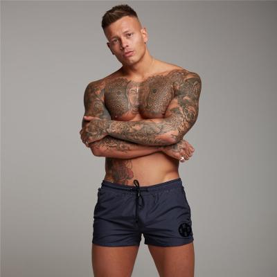 China Anti-Wrinkle Men Running Shorts Bodybuilding Muscle Training Sportswear Exercise Gym Shorts for sale