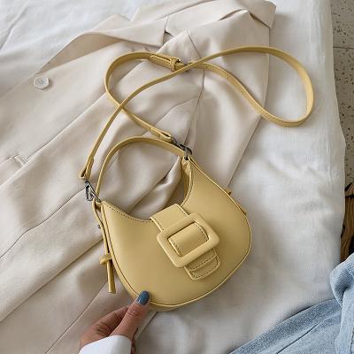 China High Quality Small Buckle Solid Color PU Leather Shoulder Bag Travel Purse Phone Bags Saddle Clutch Bag for sale