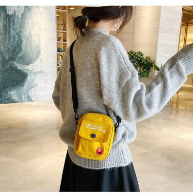 China 2021 New Casual Mini Canvas Bags Mobile Phone Cross Body Bag Wider Shoulder for sale