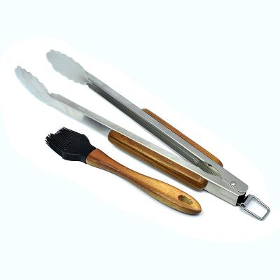 China Hot Selling Easily Cleaned Natural Acacia Wood Handle Set Of 2 BBQ Tools With BBQ Accessories for sale