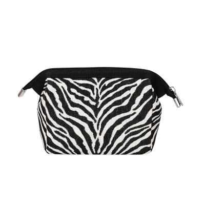 China Fashion embroidery canvas zebra stripe multi-function cosmetic pocket large portable storage cosmetic bags for sale