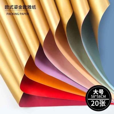 China Wholesale Plastic Double Sided Gold Wrapping Paper Waterproof High Quality Valentine's Day Flower Wrapping Paper for sale