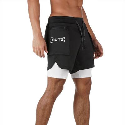 China QUICK DRY summer quick-drying fitness sports shorts fashion double layer custom gym sweat abbreviations men for sale