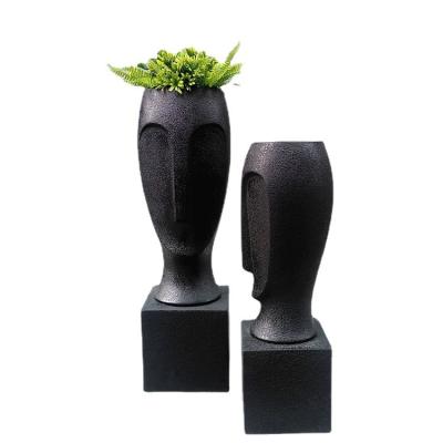 China Modern Decoration Modern Head Pots Restaurant Hotel Design Indoor Outdoor Face Planter With Stand for sale