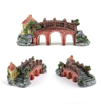 China Viable Ornament Aquatic Caves Hide Hut Resin Bridge Aquarium Decorations For Fish Tank for sale