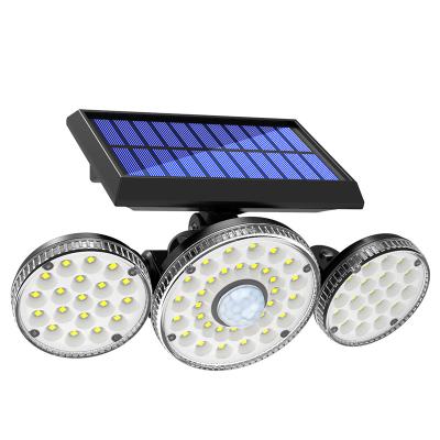 China Garden 3 Head Motion Sensor 83COB Security Lights Solar Security Light Outdoor Adjustable Flood Lights Spotlights 360 Rotatable for sale