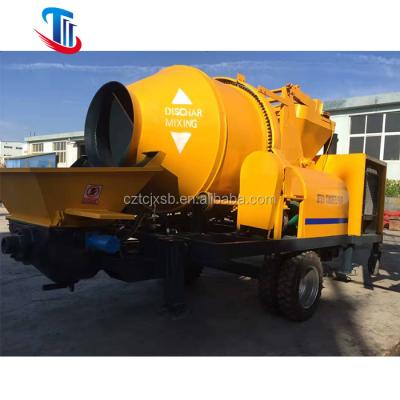 Cina Construction material shops 2020 hot sale electric power diesel concrete mixer with pump with 100m hose line in vendita