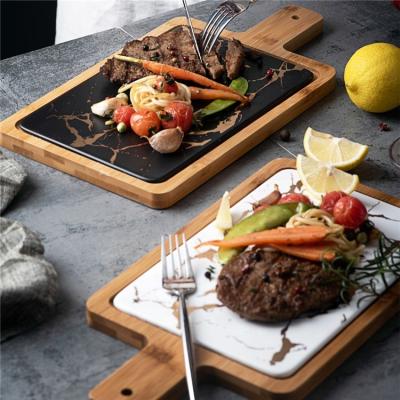 China Sustainable Dinner Charger Dishes Restaurant Rectangle Black Flat Dessert Dish With Wooden Tray for sale