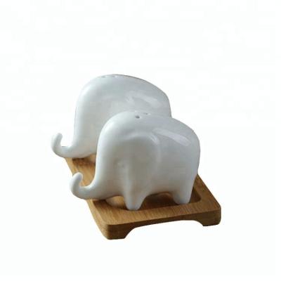 China Sustainable Lovely Elephant Shape White Ceramic Hotel Kitchen Tools Salt And Pepper Shaker Set For Christmas for sale