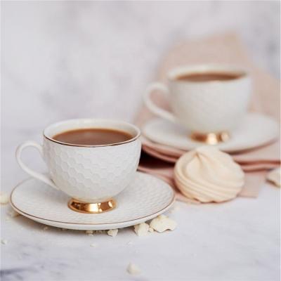 China Viable Middle East relief texture teaware coffee tea cup saucer set ceramic tea cup for party for sale