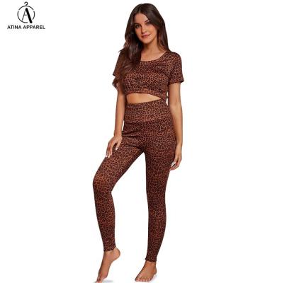 China 2021 New Arrival QUICK DRY Women's Short Sleeve Sports Yoga Suit Leopard Jogging Top With Leopard Legging Two Piece Set for sale