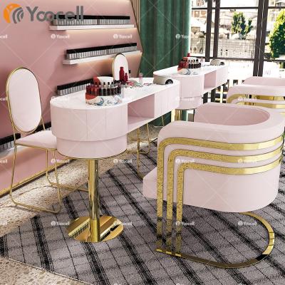 China Yoocell Best Modern Pink Nail Table Gold Manicure Station Beauty Salon Nail Bar Manicure Table for sale