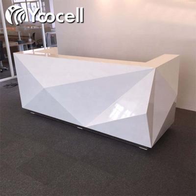 China Yoocell Modern White Polyhedron Design Special Counter Reception Cash Table for Hair Salon and Beauty Salon for sale