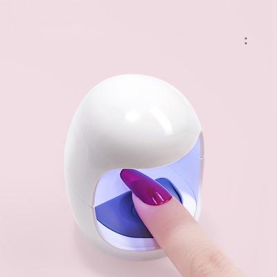 China Stainless Steel Charging Egg LED Nail Lamp Portable USB UV Dryer Wire Sun Mini Nail Lamp For Gel Polish Curing for sale