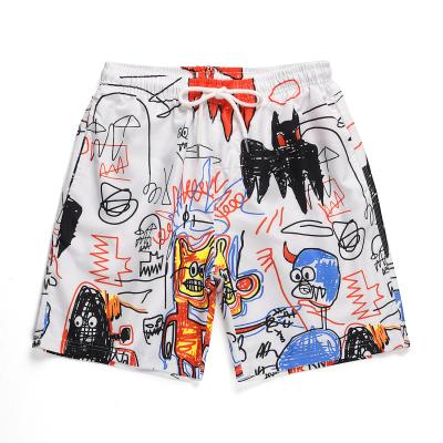 China 2021 New Trend Breathable Anti-sweat Loose Graffiti Printing Men's And Women's Short Pants for sale