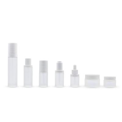 China Cosmetic Packaging In Stock 30/50//80/100ml Glass Cosmetic Matte Frosted Bottle Lotion Pump Screw Seal Bottle for sale