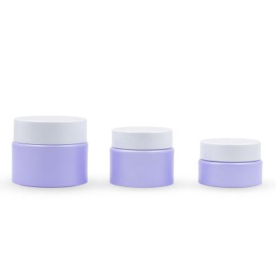 China 20g/30g/50g high quality purple spray-coated design cosmetic facial body scrub container plastic jar for sale