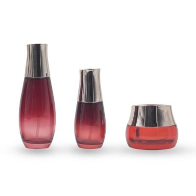 China Factory Direct Packaging 75/120ml 50g Red Colors Glass Bottle Serie Cosmetic Packaging for sale