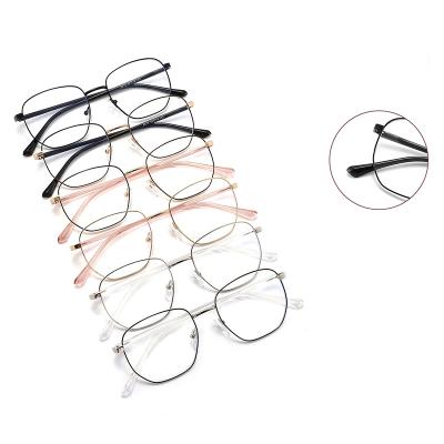 China Fashionable HTX Monturas De Gafas Retro Metal Glasses Spectacle Optical Glass Frames For Women for sale