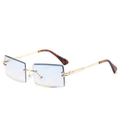 China 400 2021 Fashion Eyewear Wholesale Anti-UV Luxury Multifunctional Colorful Rimless Sunglasses For Unisex for sale