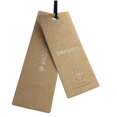 Chine Brown imprimé fait sur commande donnent à la feuille d'or une consistance rugueuse de papier d'étiquettes de bagage emboutissant Logo Supplier à vendre