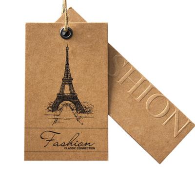 China Papel impreso de encargo Hang Tags de Brown Kraft para la ropa con el logotipo grabado en relieve en venta