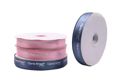 China Silver Hot Stamping Printed Satin Ribbon 1000 Yards With Custom Logo Printing for sale