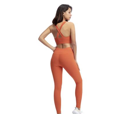 China Pure Color Breathable Pure Color Striped Yoga Bra Legging 2 PC Women Fitness Yoga Suit Set for sale