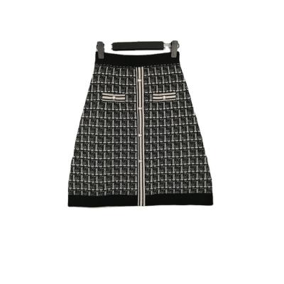 China Hot Selling Breathable Knitted Ladies To Skirt Women's Autumn And Winter Plaid All-Match A Line Thin Skirt for sale