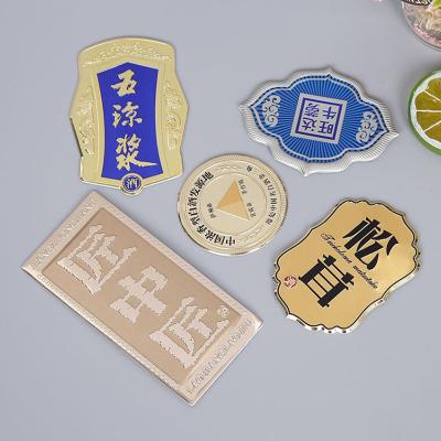 China Custom Waterproof Private Apparel Labels Sewing Logo For Clothes Handbag Jeans Swimwear Luggage Patch Metal Labels for sale