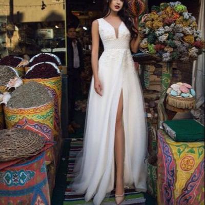 China ZH2563Q Breathable Sexy Thigh High Split A Line Glamorous Sleeveless V-Neck Backless Button Lace Appliques Wedding Dresses Wedding Gowns for sale