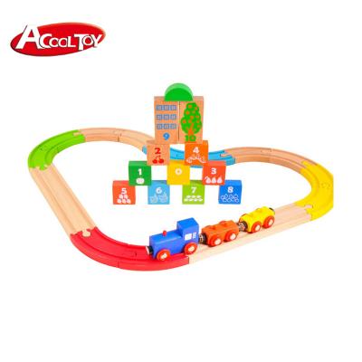 China Slot Toy Montessori Puzzle Game Over Wooden House Blockswooden Blocks Train Track Set Railway Toy for sale