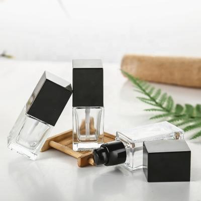 China 30ml Food Flint Bottles Pressure Pump Glass Cosmetic Glass Lotion Bottle/Cosmetics China Supplier for sale