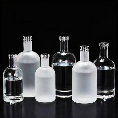 China Craft Spirit 750ml Vodka Glass Bottle Manufacturers Frosted 1 Liter Liquor Glass Water Bottles Wholesale for sale